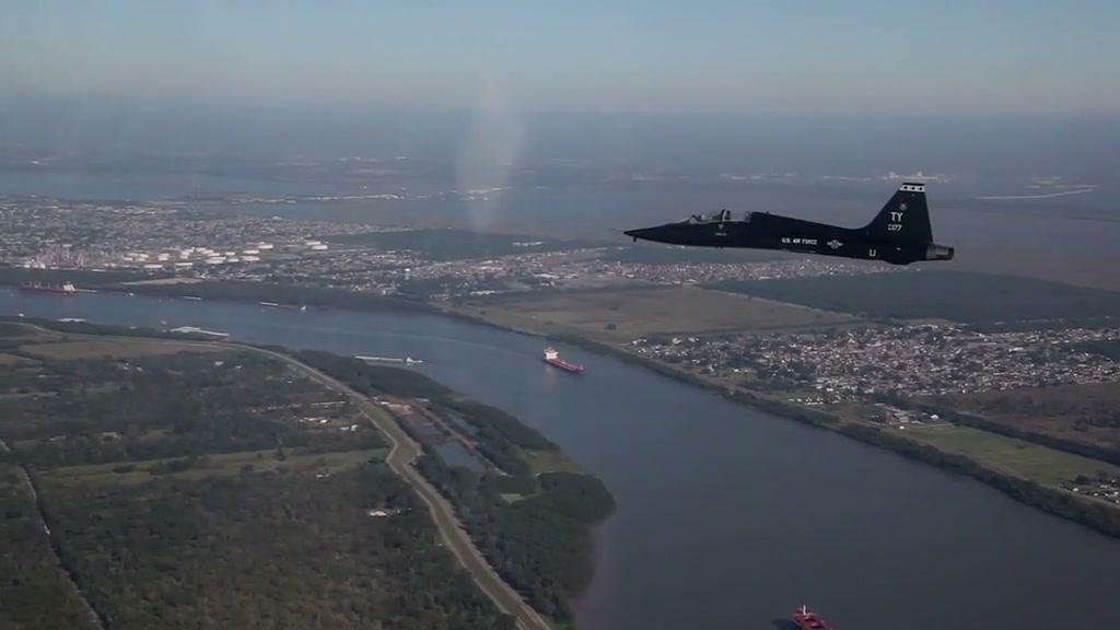 Military aircraft flying in formation