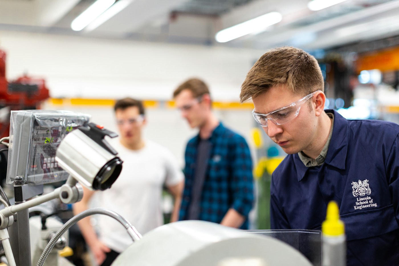 Technical specialist working with industrial equipment