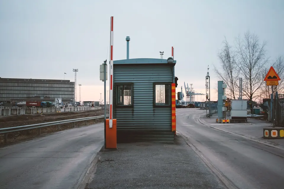 Guard booth and barrier arm at a site entrance