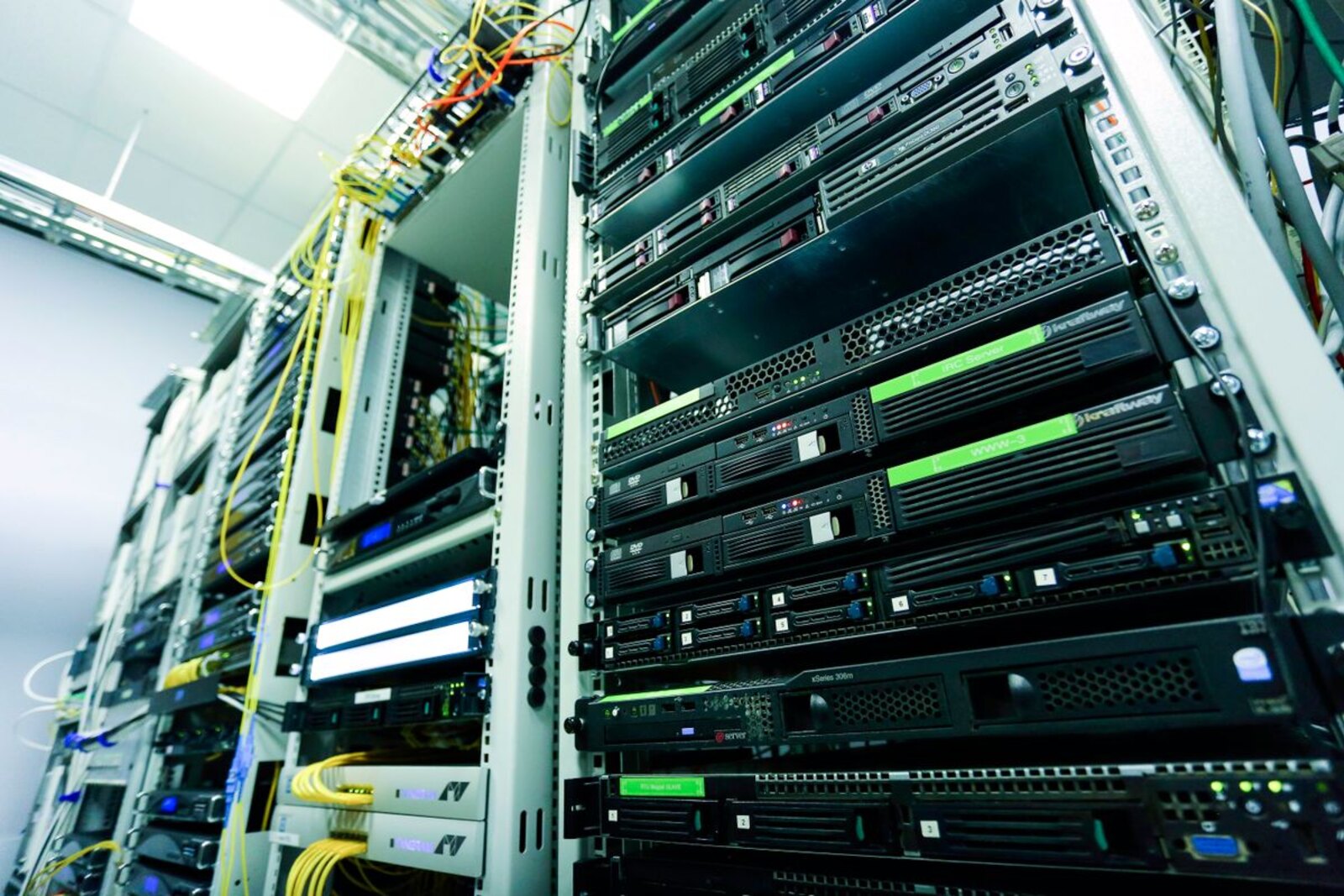 Rows of network servers in a data room.