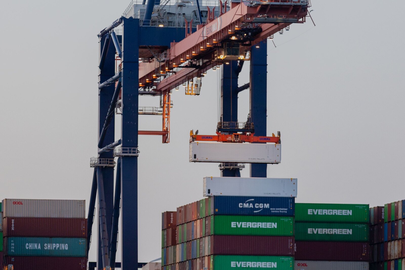 Cargo container terminal with gantry cranes.